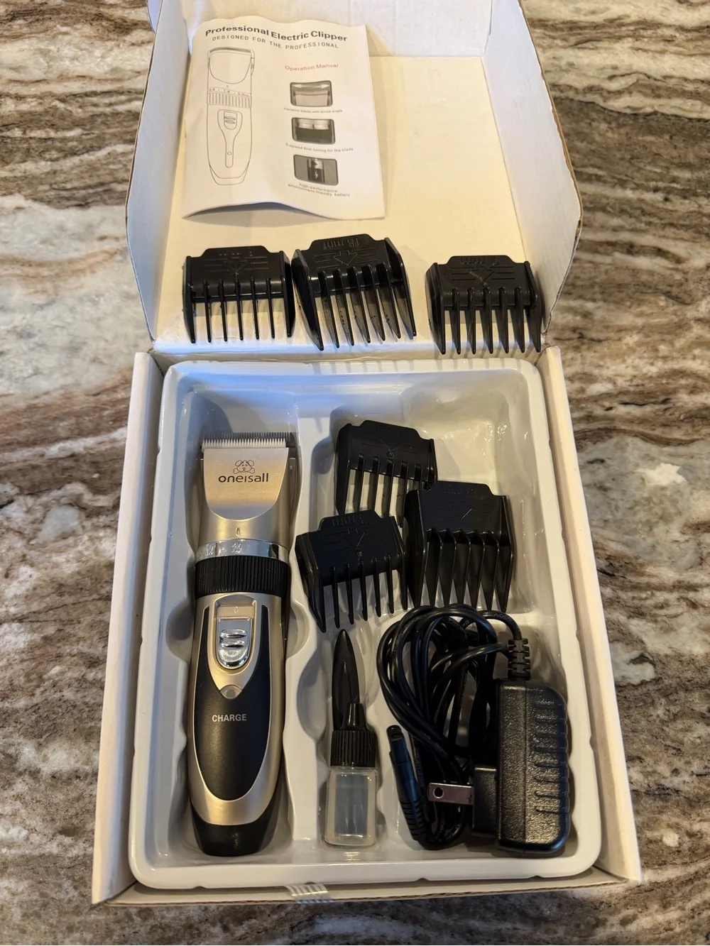 Oneisall Pet grooming clippers- in box low noise and rechargeable.